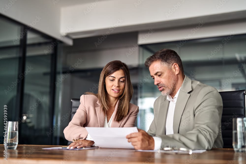 Professional accountant consulting with client using Odoo Thai Accounting